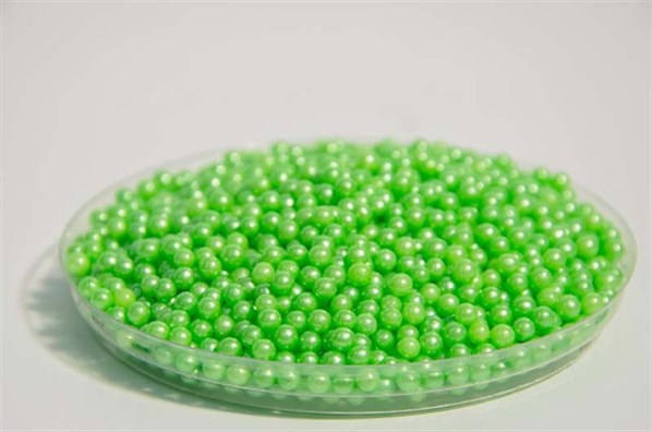 Green round shaped sprinkles