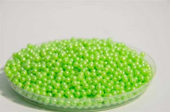 Green round shaped sprinkles